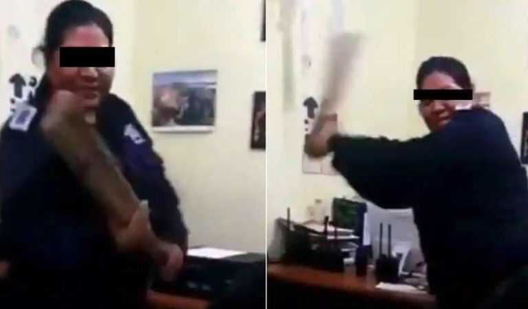 Difunden video de una mujer policía castigando con una tabla a persona detenida