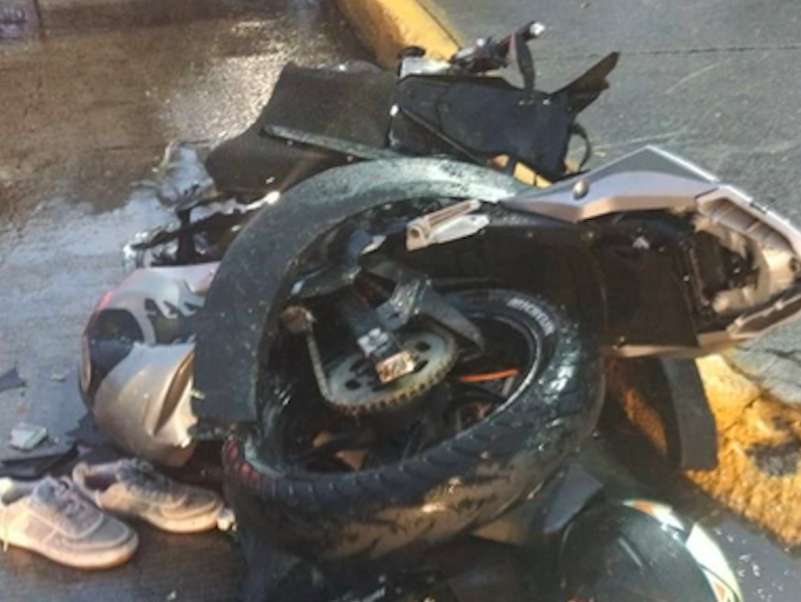 Biker arrollado bajo la lluvia en la vialidad López Portillo 1